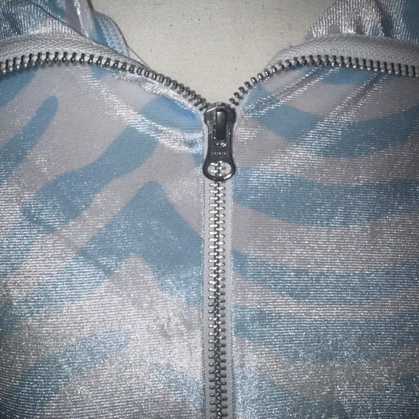 Icy zebra zip up crop top