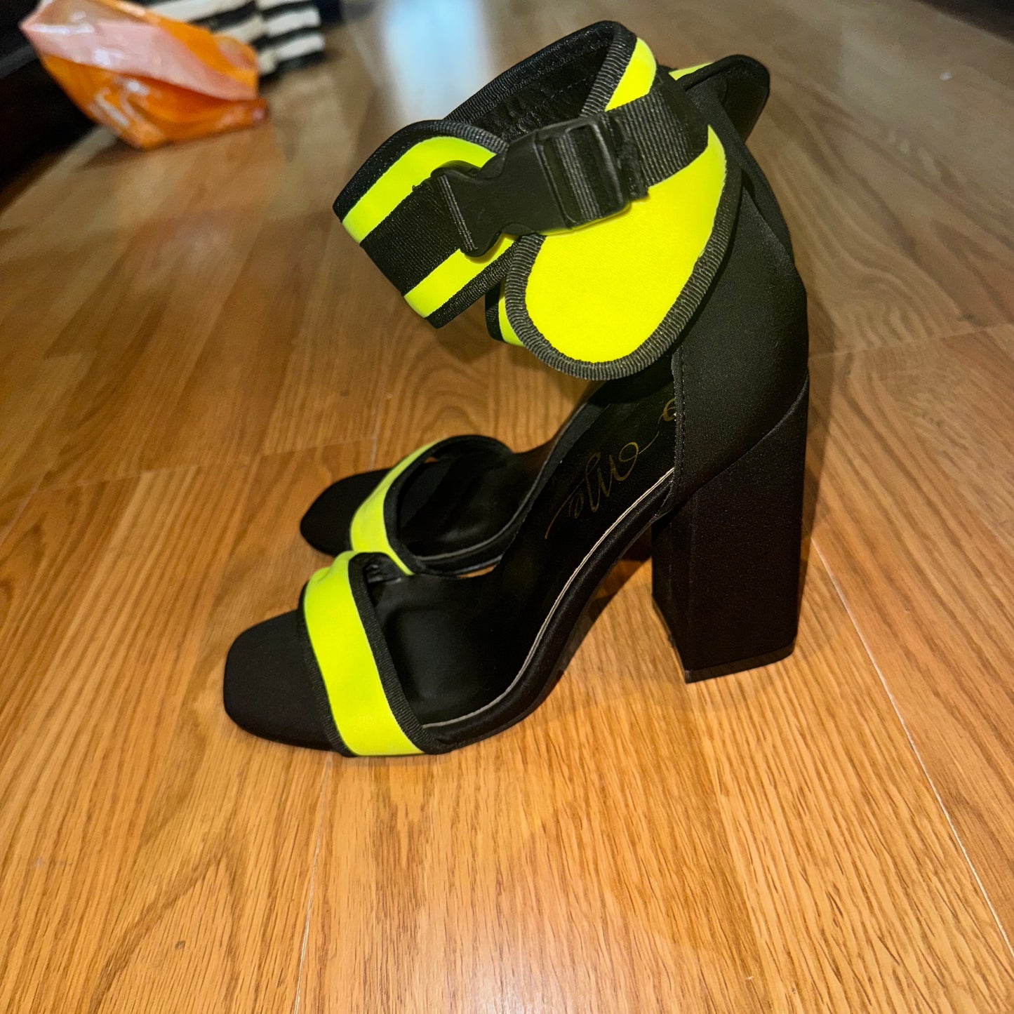 Neon & black pumps
