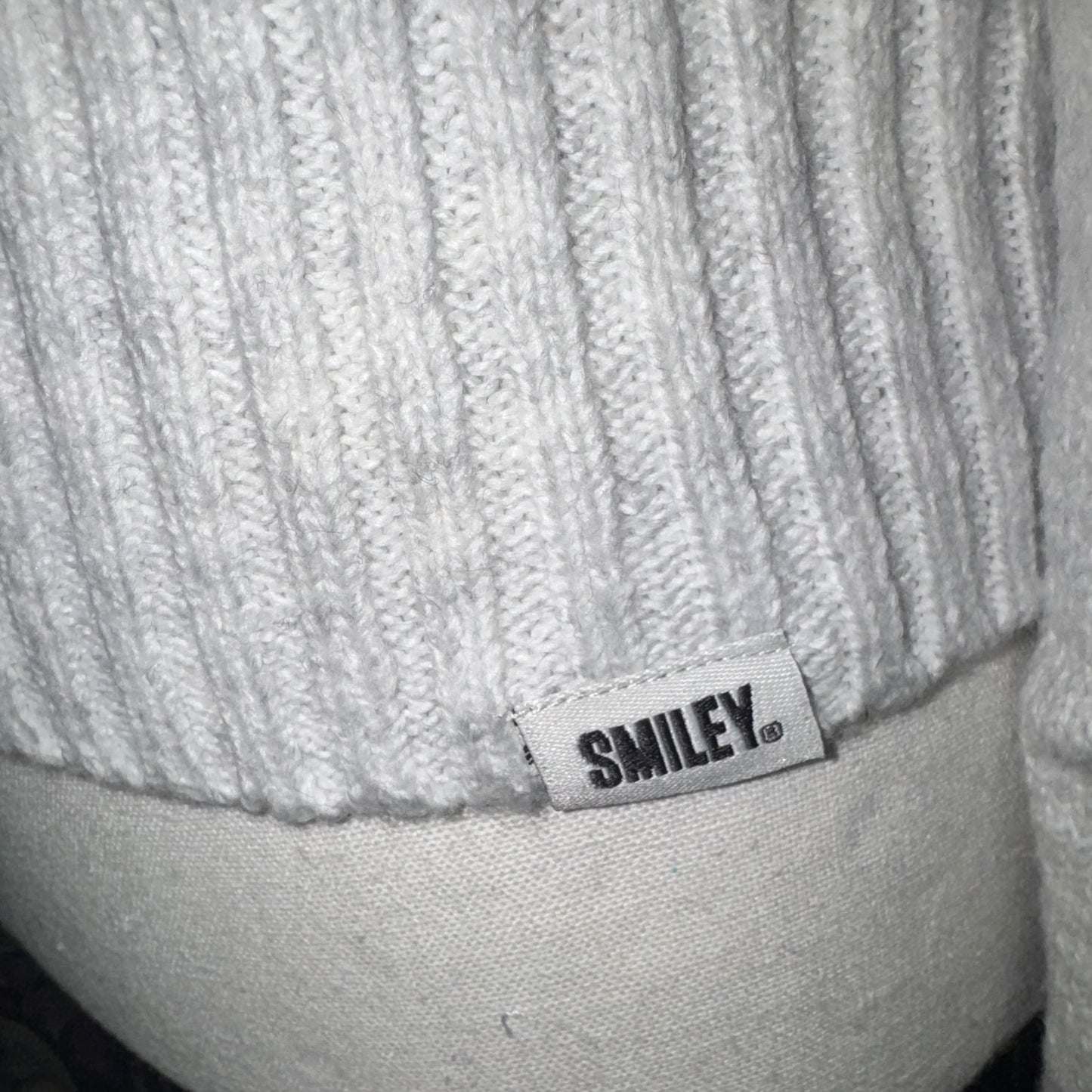 Smiley mock neck sweater